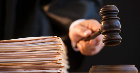 image-judge-holding-gavel-close-up